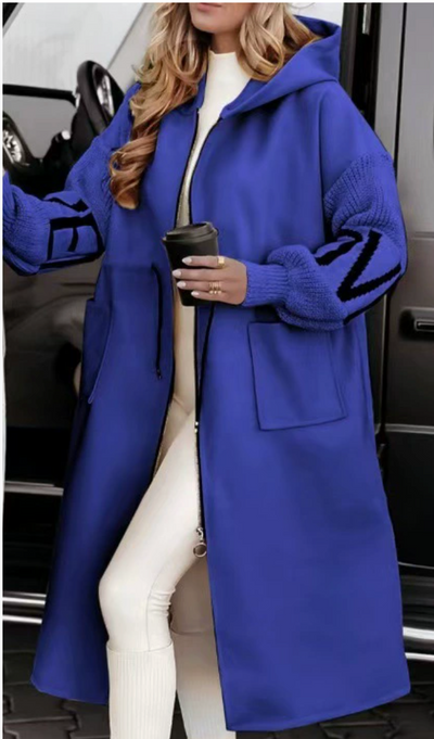 Vera – Długa kremowa kurtka z dzianinowymi rękawami